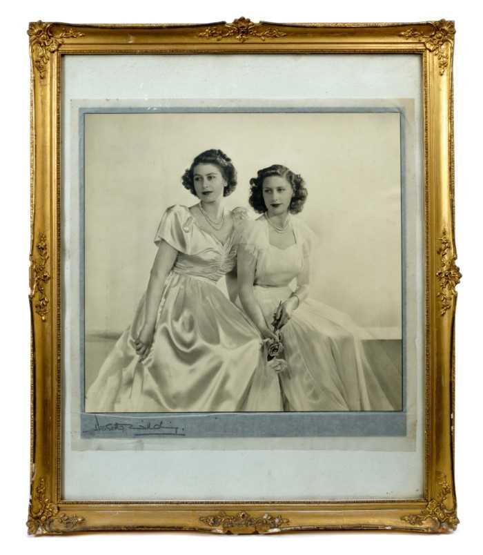 Lot 16 - T.R.H. Princess Elizabeth (Later Queen Elizabeth II) and Princess Margaret , fine black and white portrait photograph by Dorothy Wilding taken 27th May 1946 , signed by the photographer in origin...
