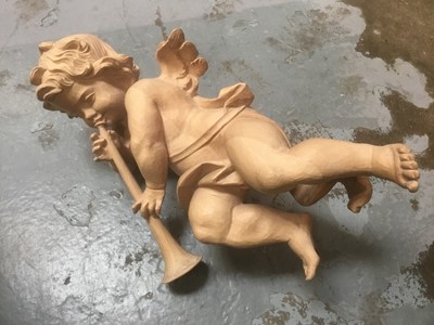 Lot 237 - Continental maple wood carving of a cherub