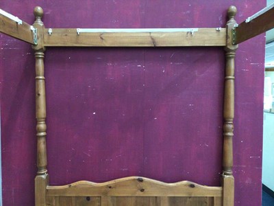 Lot 380 - Victorian-style pine four poster bedstead with turned columns and slatted base, 5'1" wide