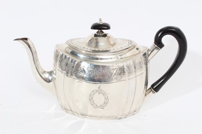 Lot 447 - George III Irish silver teapot