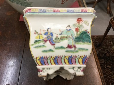 Lot 107 - Chinese famille rose porcelain jardiniere with tin liner, early 20th century, decorated with figural scenes with patterned borders, 24.25cm wide