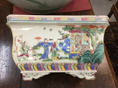 Lot 107 - Chinese famille rose porcelain jardiniere with tin liner, early 20th century, decorated with figural scenes with patterned borders, 24.25cm wide