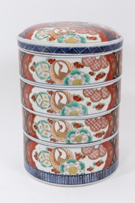 Lot 246 - Set of 19th century Japanese Meiji stacking boxes, together with three Imari cups