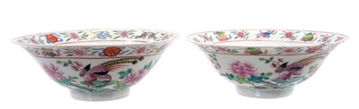 Lot 232 - Pair of Chinese famille rose porcelain bowls, c.1900, decorated with tropical birds, flowers and auspicious symbols, iron red seal marks to bases,  19cm diameter