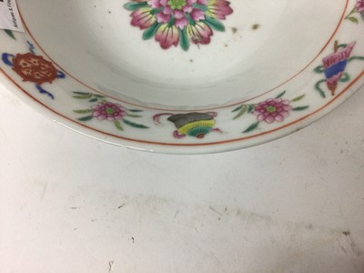 Lot 132 - Pair of Chinese famille rose porcelain bowls, c.1900, decorated with tropical birds, flowers and auspicious symbols, iron red seal marks to bases,  19cm diameter