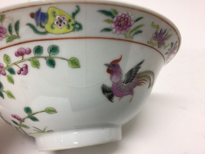 Lot 113 - Pair of Chinese famille rose porcelain bowls, c.1900, decorated with tropical birds, flowers and auspicious symbols, iron red seal marks to bases,  19cm diameter