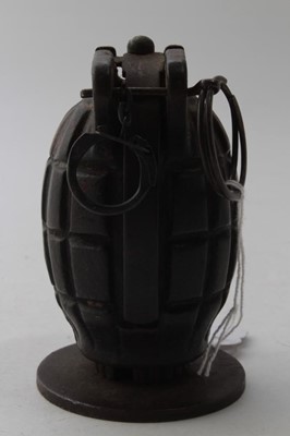 Lot 718 - Second World War British Army Deactivated Mills Bomb / Hand Grenade, mounted on circular plinth