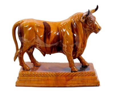 Lot 154 - A large glazed pottery model of a bull, M Mafra, Caldas Portugal