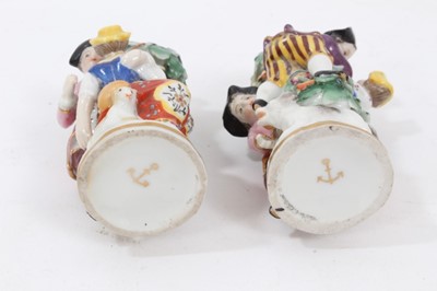 Lot 122 - Four continental porcelain scent bottles, including a pair of Samson figural examples, a cat and a dog