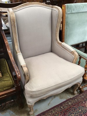 Lot 1517 - Contemporary armchair with limed show-wood frame, upholstered in grey fabric