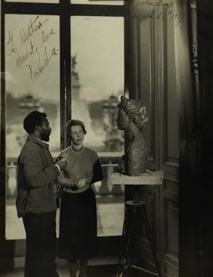 Lot 1502 - Pamela Chandler (1928-1993) portrait of the photographer with sculptor Ben Enwonwu and his bust of H.R.H. Queen Elizabeth II