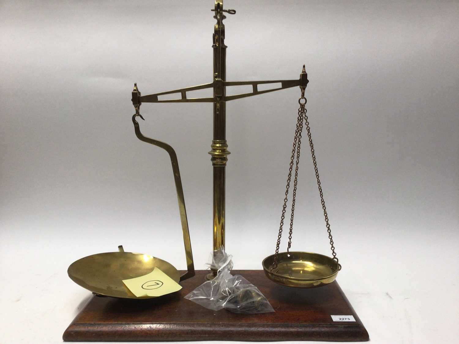 Lot 2273 - Antique brass shop scales on mahogany base