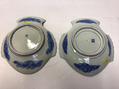 Lot 1036 - Pair of late 19th century Japanese pottery fish shape plates