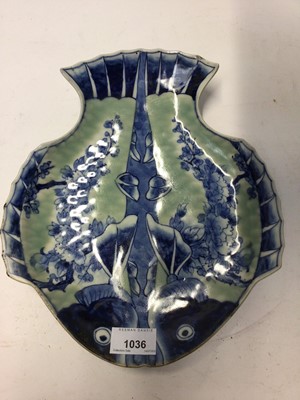 Lot 1036 - Pair of late 19th century Japanese pottery fish shape plates