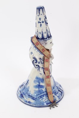 Lot 134 - Three 19th century French faience items, including a plaque painted with a scene of a figure and two goats with a harbour scene in the background, with scrollwork edge, measuring 35cm across, toget...