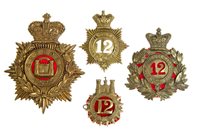 Lot 172 - Three 12th (Suffolk) Regiment badges and QEII...