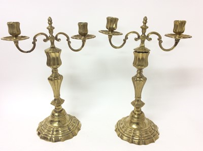 Lot 983 - Mid 18th century pair of French brass candelabra