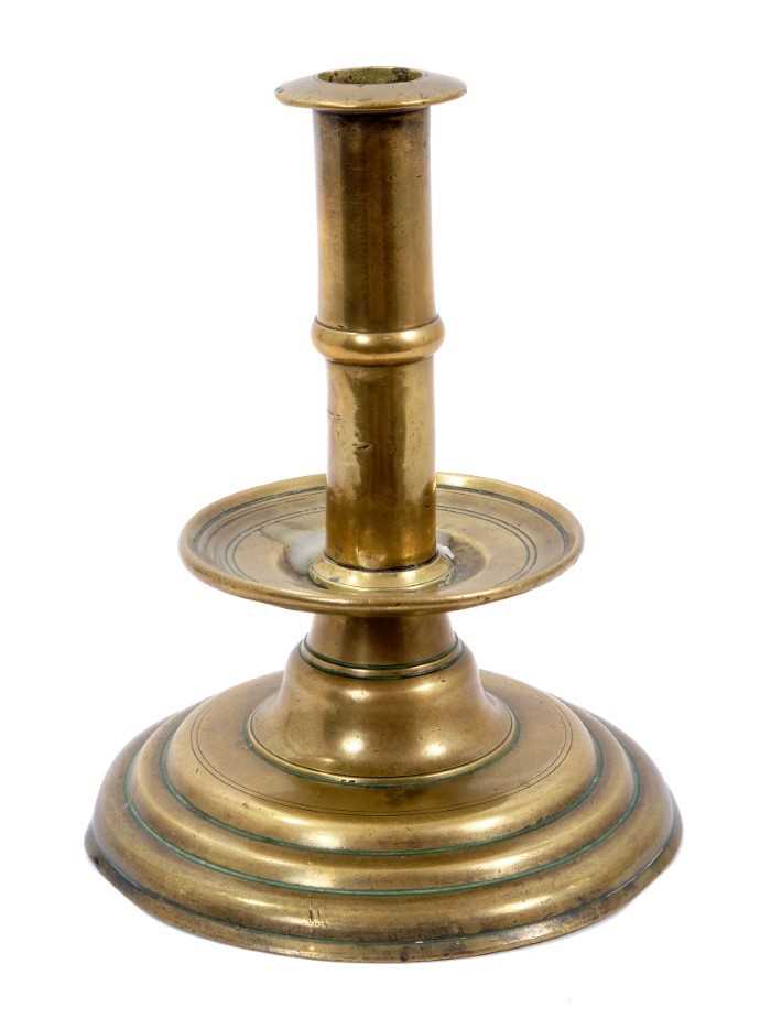 Lot 979 - Rare 17th century brass trumpet form candlestick