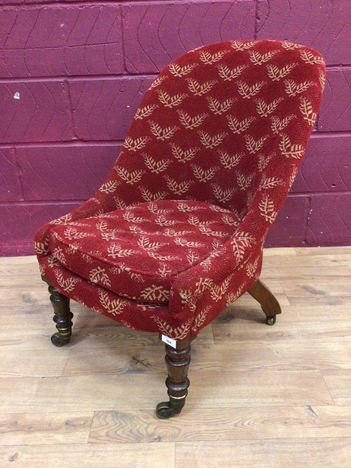 Lot 304 - Victorian tub chair or red moquette on turned rosewood legs