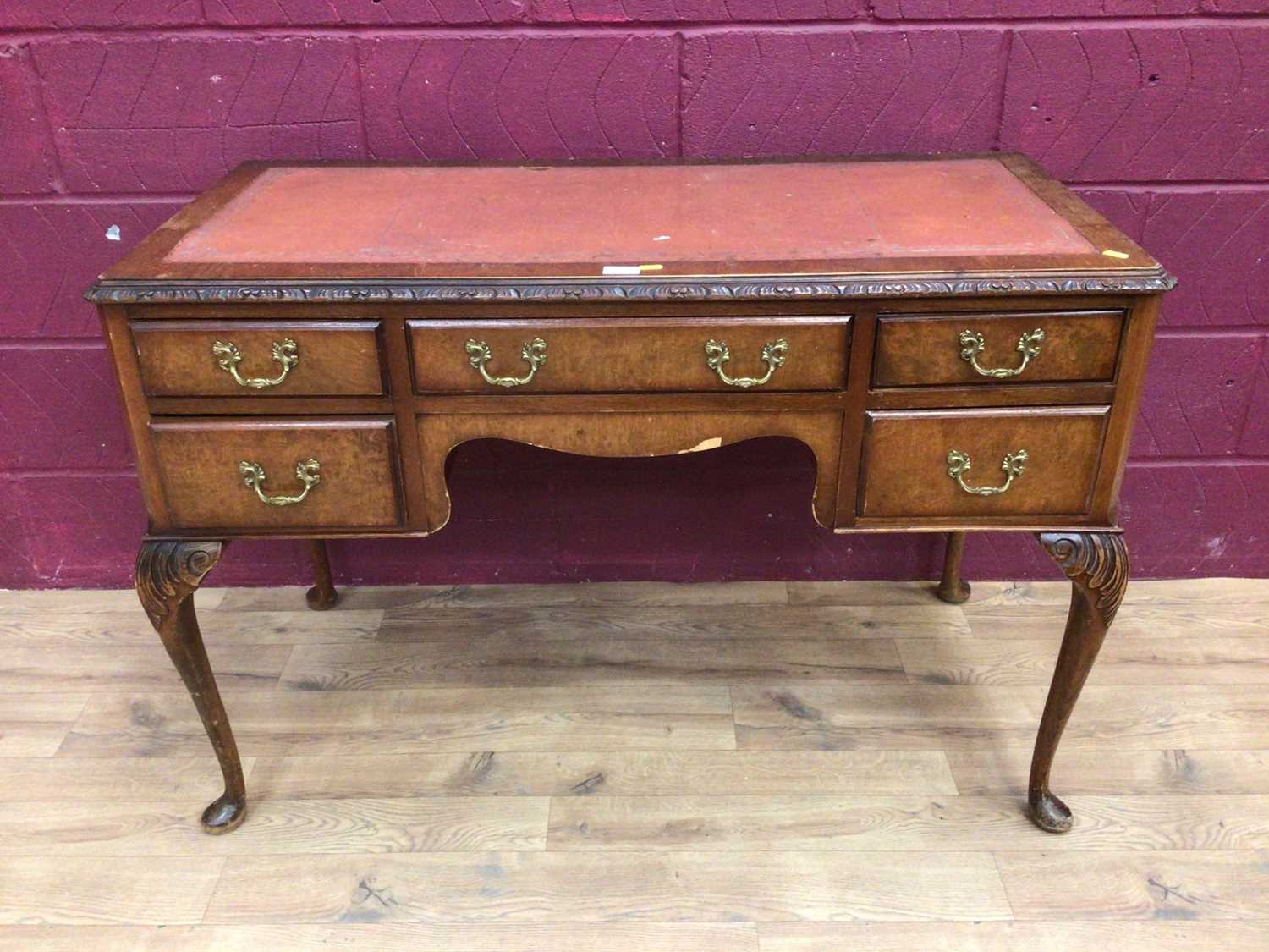 Lot 308 - Kneehole desk with tooled leather top, five drawers on cabriole legs