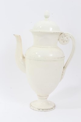 Lot 157 - Pair of 19th century creamware coffee pots, the handles with flower and leaf terminals, the covers with acorn finials, 30.5cm and 31cm high