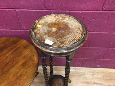 Lot 301 - Georgian mahogany tilt top wine table, oak two tier torchere with spiral twist supports and an oak folding cake stand