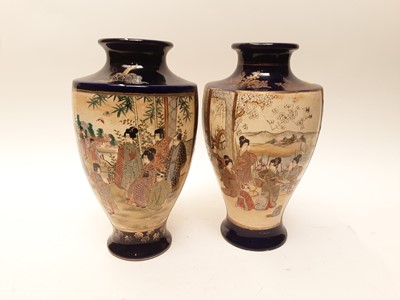 Lot 1114 - Pair of Japanese Satsuma pottery vases and a pair of Japanese porcelain vases