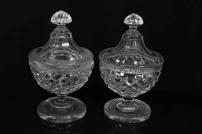 Lot 161 - Garniture of 19th century cut glass sweetmeat vases and covers, the larger example with slightly varying decoration, 19cm and 23cm high