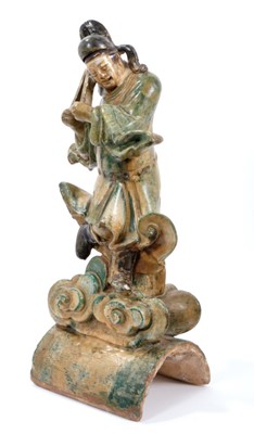 Lot 162 - Large Chinese figural pottery roof tile, Qing period, with Sancai-style green and yellow glaze, 46.5cm high