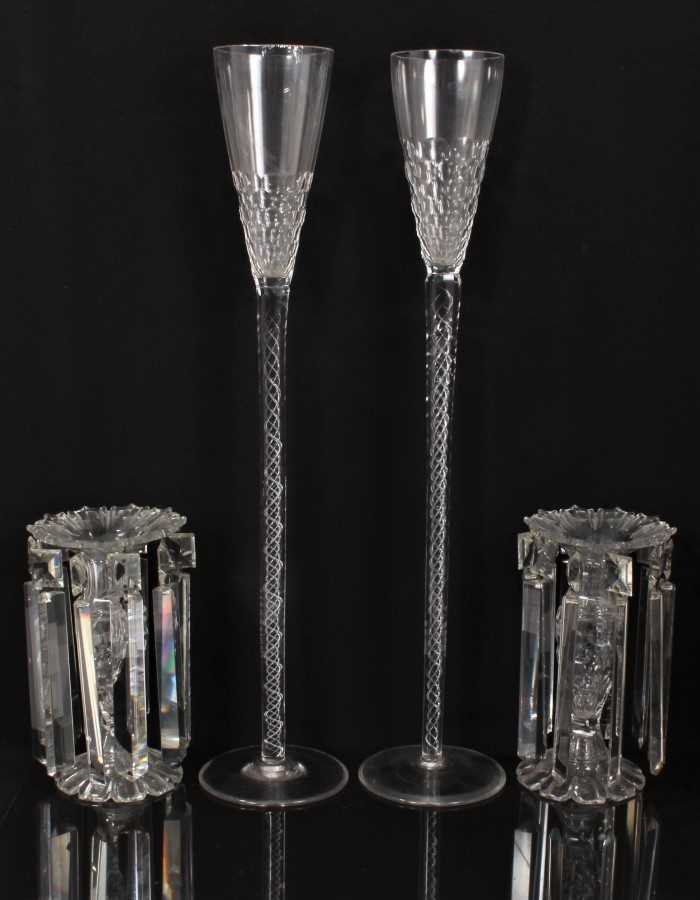 Lot 163 - Pair of Victorian cut glass lustres with prismatic drops, 23cm high, together with an oversized pair of wine glasses with cut bowls and air twist stems, c.1900, 61cm high (4)