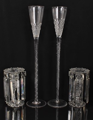 Lot 163 - Pair of Victorian cut glass lustres with prismatic drops, 23cm high, together with an oversized pair of wine glasses with cut bowls and air twist stems, c.1900, 61cm high (4)