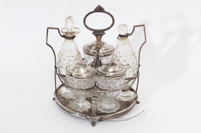 Lot 435 - George III silver cruet stand with five matching bottles