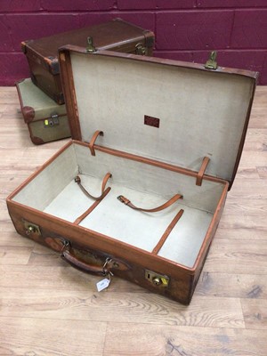 Lot 321 - Three vintage suitcases to include a brown leather case with Cunard White Star labels