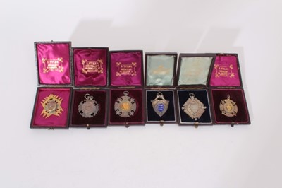 Lot 363 - G.B. Silver and Gilt Athletics Fob-Medallion x 6 circa 1890-1900 awarded to J.R. Deeley Spartan/Beaumont Harriers, all in cases of issue (1 medallions)