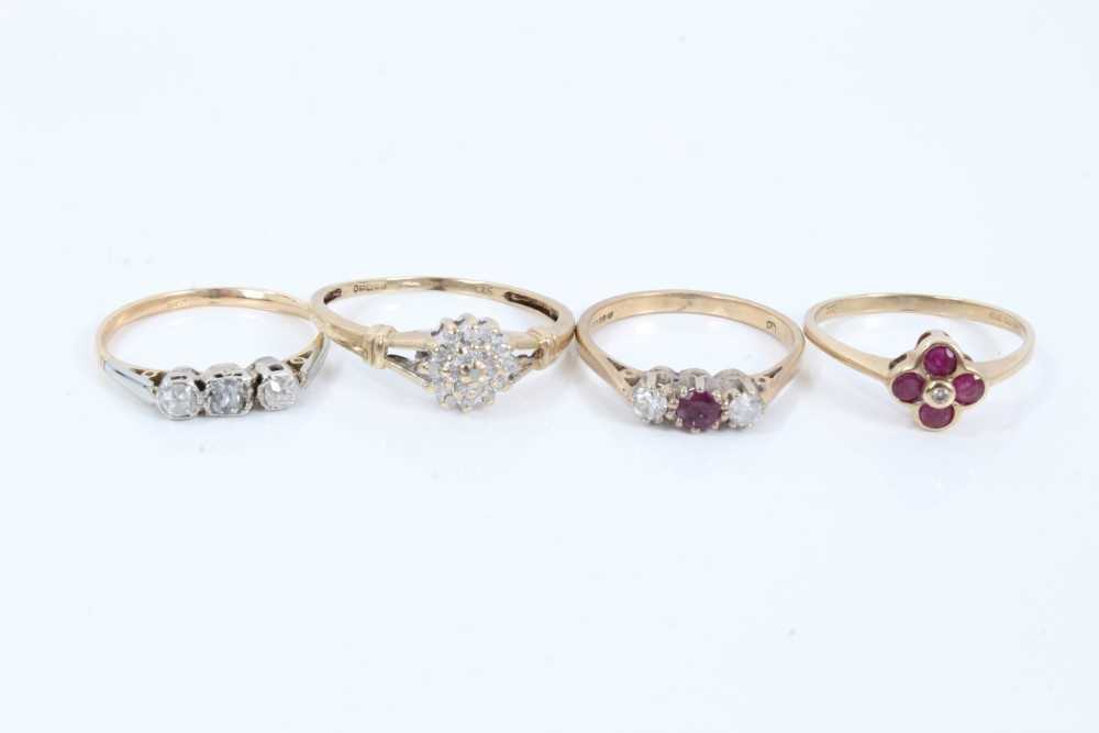 Lot 59 - Four gold diamond and ruby rings