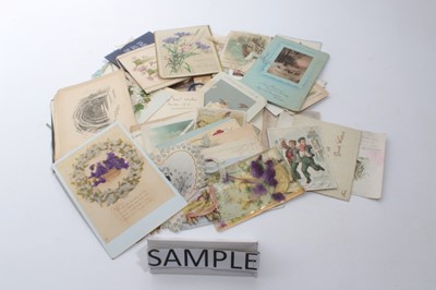 Lot 1263 - One tin of assorted early 20th century greetings cards and postcards