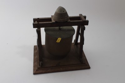 Lot 637 - First World War Trench Art Dinner Gong, with brass shell suspended on an oak frame, the top mounted with a fuse, 23cm in overall length