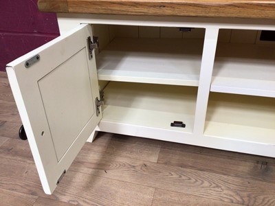 Lot 376 - Contemporary white painted and pine television unit together with a similar table (2)