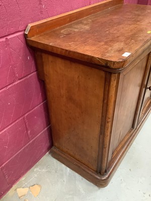 Lot 421 - Victorian mahogany secretaire cupboard with fitted pull-out secretaire drawer and four further drawers below enclosed by two panelled doors, retailed by Maple & Co, London