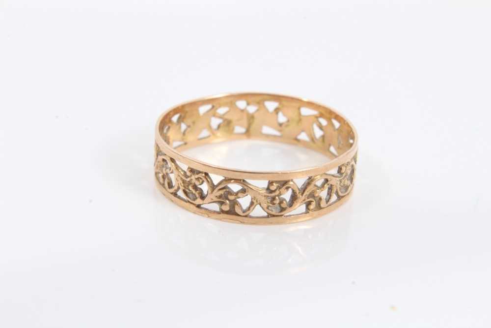 Lot 70 - Continental 14ct gold wedding ring with pierced design, size P