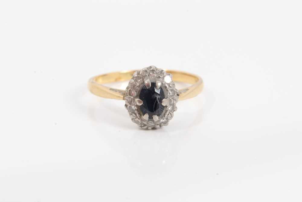 Lot 71 - 18ct gold sapphire and diamond cluster ring, size N