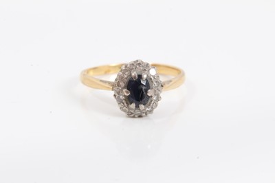 Lot 71 - 18ct gold sapphire and diamond cluster ring, size N
