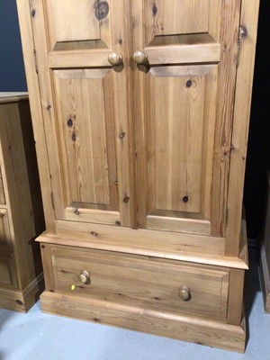 Lot 4 - Modern pine double wardrobe with two panelled doors and drawer below, 97.5cm wide x 63cm deep x 208.5 cm high