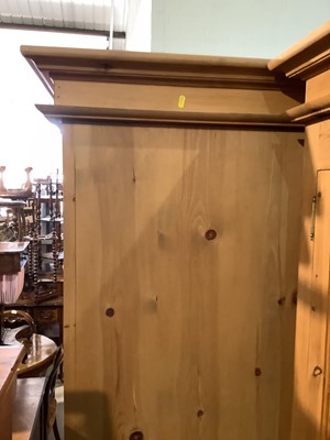 Lot 4 - Modern pine double wardrobe with two panelled doors and drawer below, 97.5cm wide x 63cm deep x 208.5 cm high