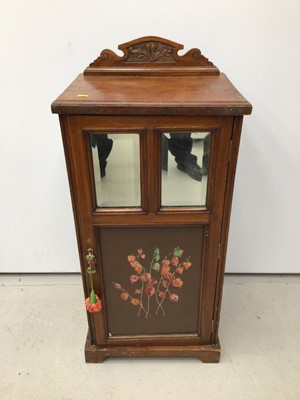 Lot 18 - Edwardian walnut pot cupboard with ledge back, two bevelled mirror plates and painted door below, 45.5cm wide x 34cm deep x 100cm high
