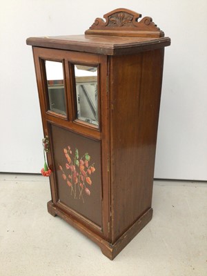 Lot 18 - Edwardian walnut pot cupboard with ledge back, two bevelled mirror plates and painted door below, 45.5cm wide x 34cm deep x 100cm high