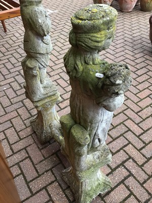 Lot 51 - Pair of concrete figures on stands 126cm and 123cm and one other of a seated gnome 40cm