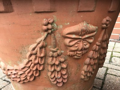 Lot 54 - Pair of large terracotta garden urns with wreath decoration 51cm x 58cm