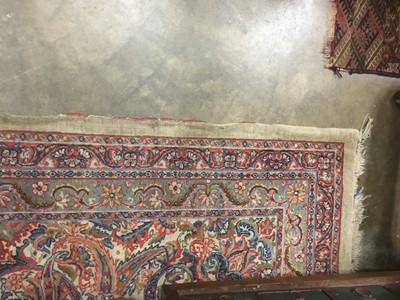 Lot 1560 - Large Persian carpet with geometric decoration on red, blue and cream ground 410cm x 630cm