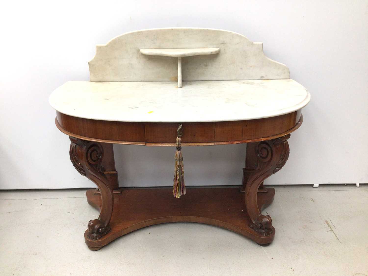 Lot 23 - Victorian mahogany demi line washstand with marble top and splash back on carved cabriole front supports with shaped base, 112cm wide x 53cm deep x 94cm high